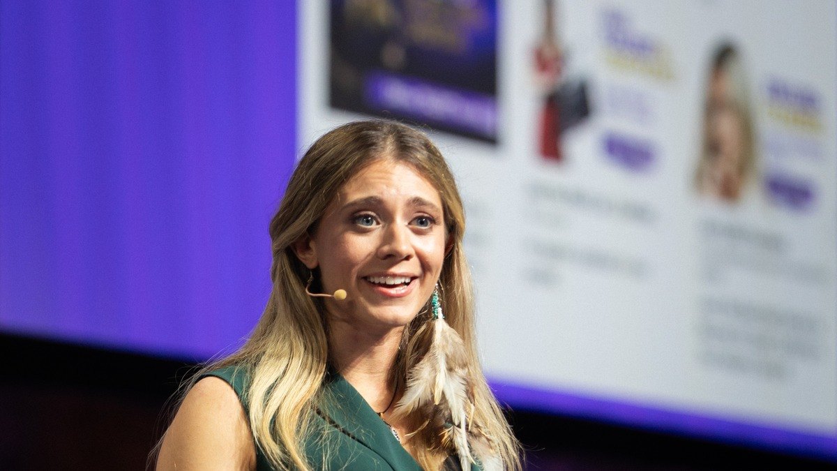 Sabrina Stocker on a summit stage